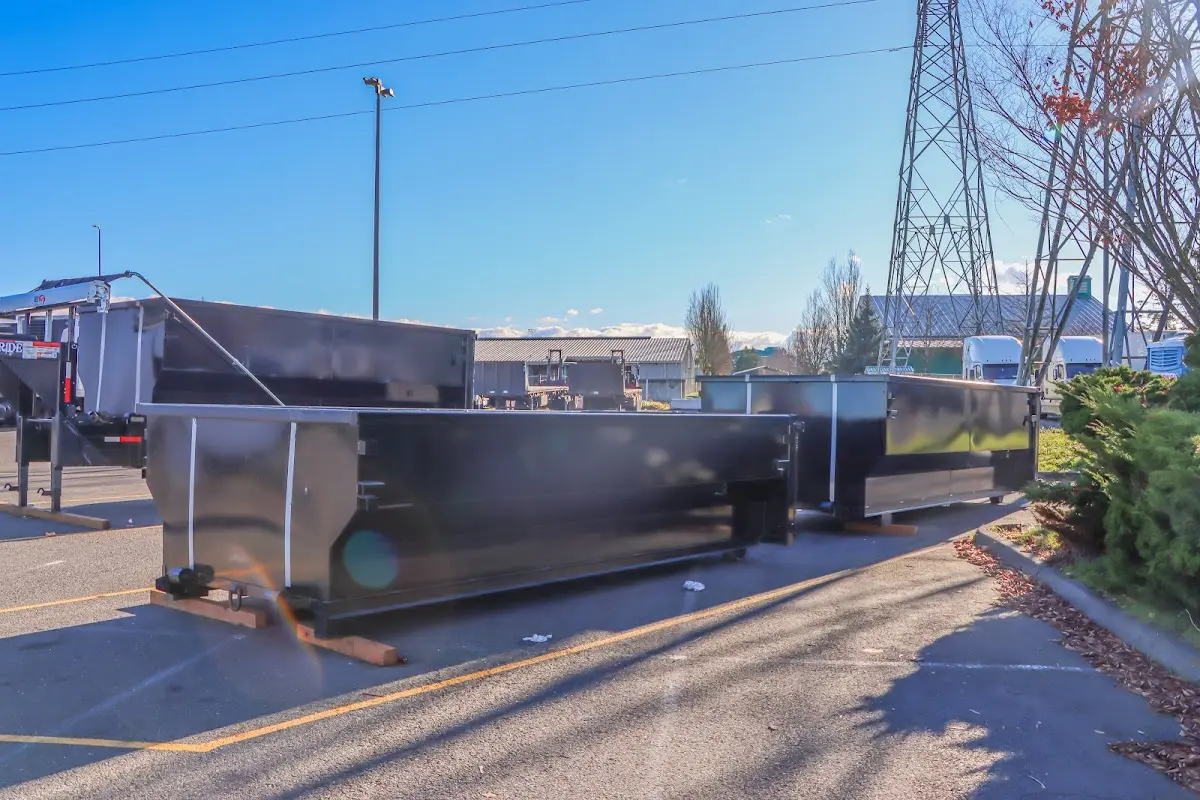 Roll-off dumpster ready for waste disposal at job site for Construction Dumpster Rental in Simi Valley